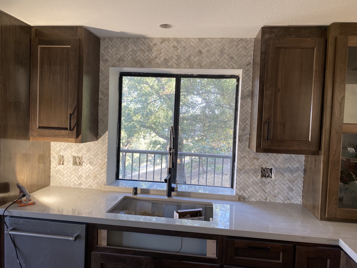 Natural stone mosaic tile backsplash installation Sacramento kitchen